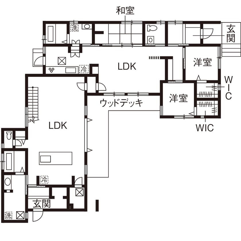 庭を中心に建物がL字型に配置された55坪の二世帯住宅の間取り図（1階）